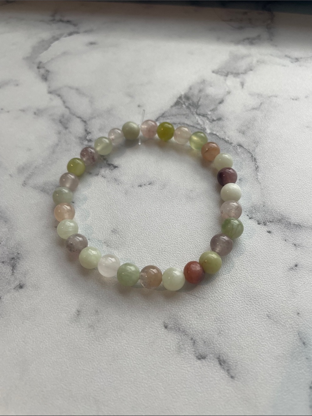 Natural stone, hand beaded elastic bracelet. 7 inches.